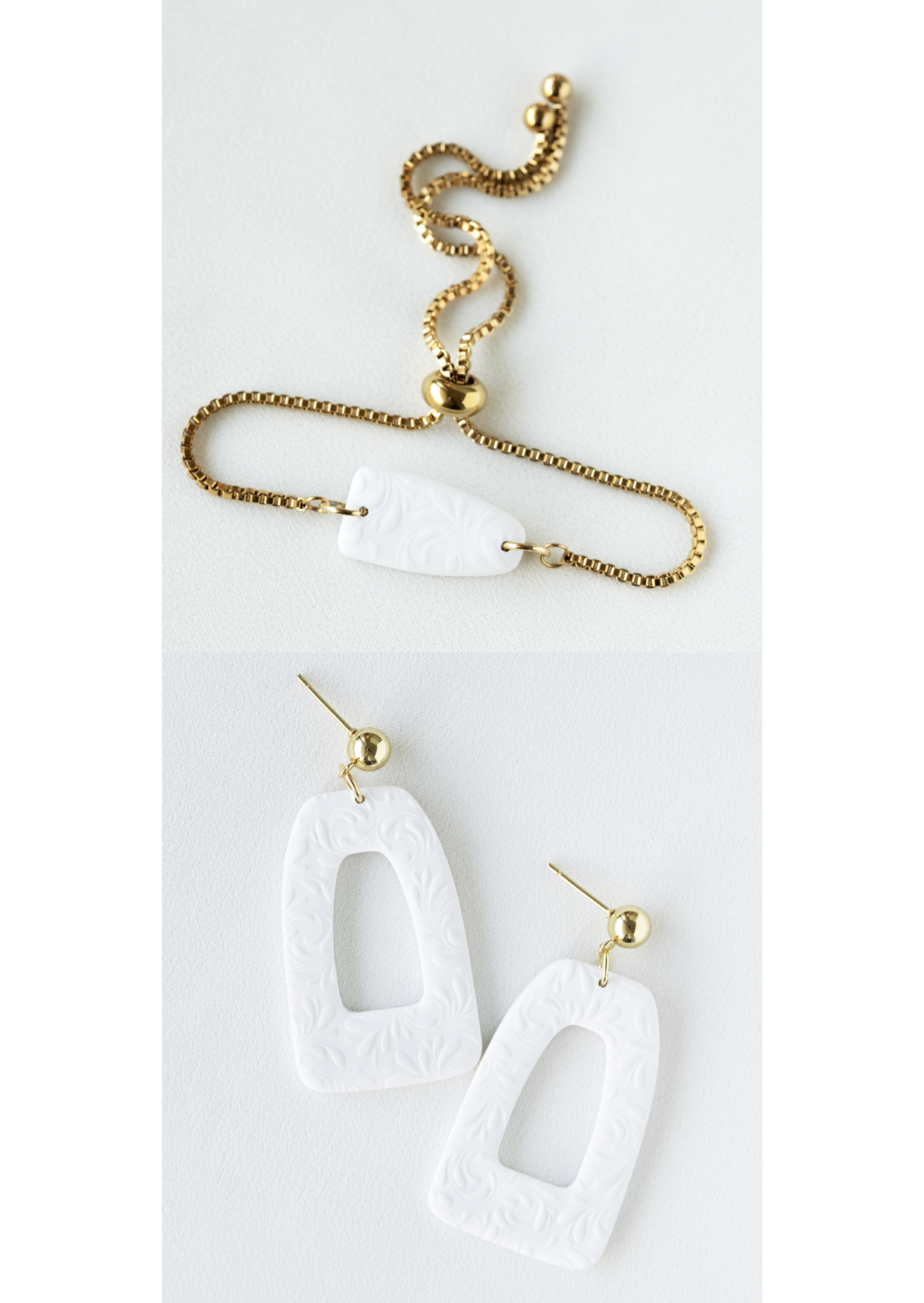 Polymer clay earring and bracelet jewelry set with white pendants on a white background.
