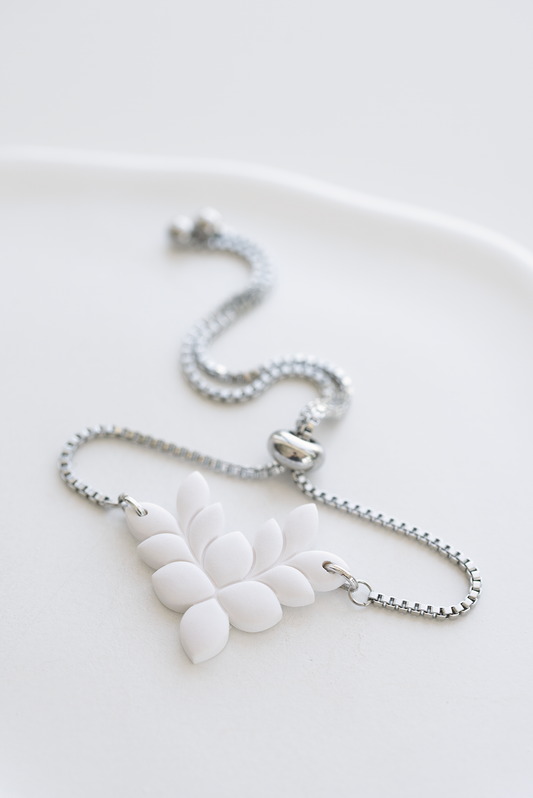 ANTIGUA hand-crafted adjustable stainless steel bracelet with white leaf polymer clay ornament, made in Dubai