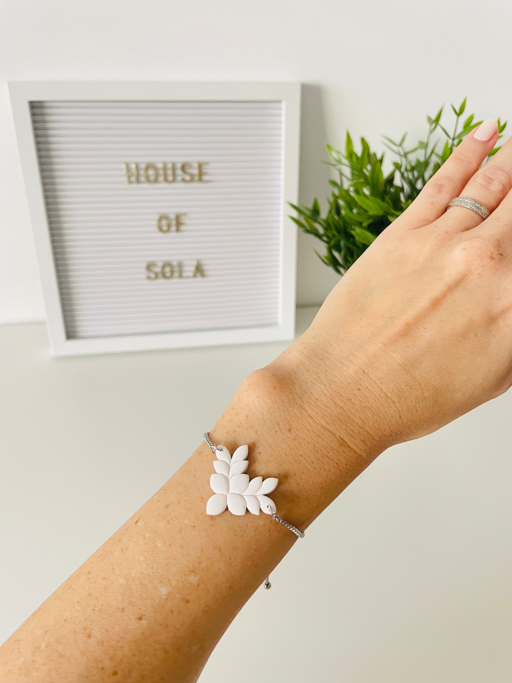 ANTIGUA polymer clay bracelet worn on wrist showing adjustable slider design and craftmanship