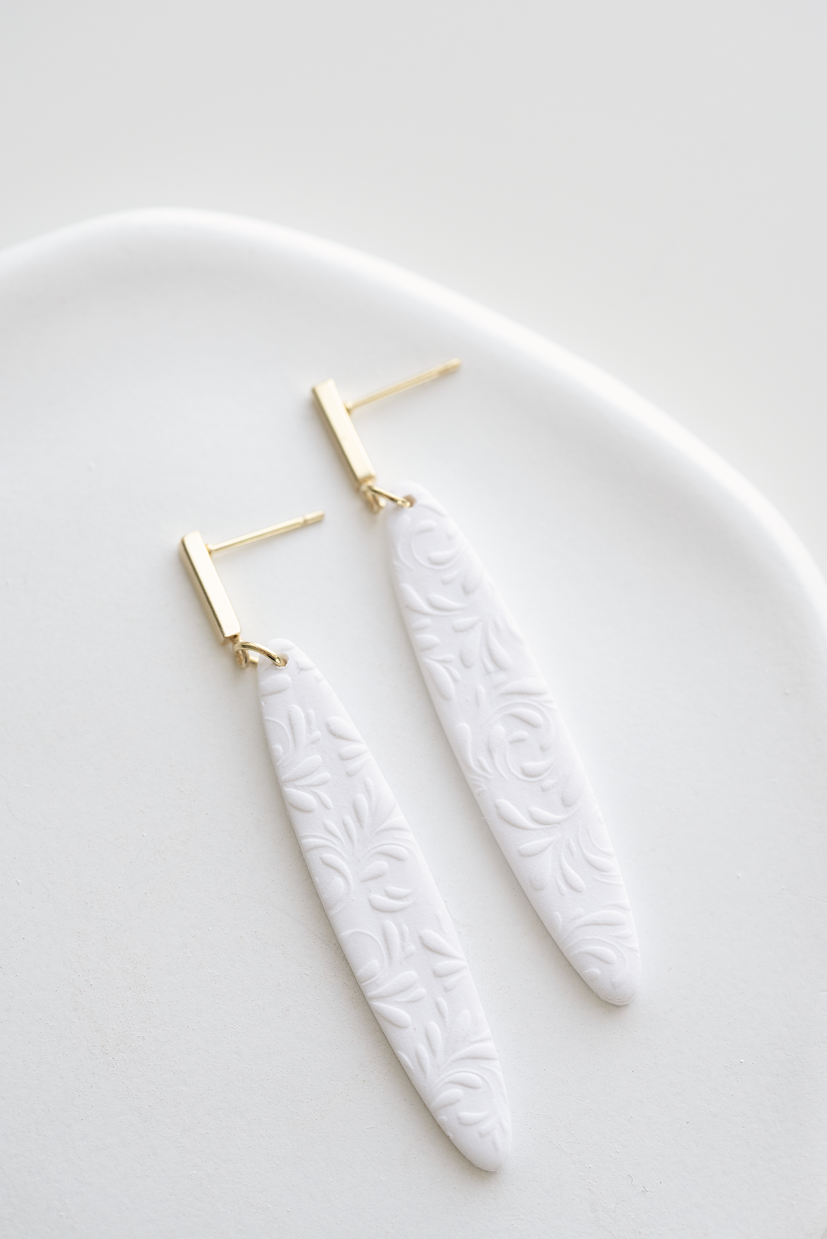 LONDON white hand-crafted polymer clay earrings, floral pattern, gold plated stainless steel bar post, lightweight