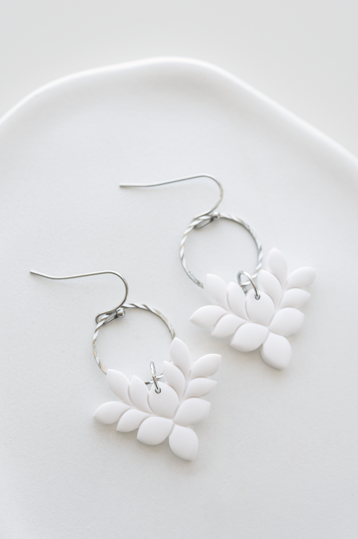 MALIBU polymer clay statement earrings in white, lightweight and modern, leaf shape, stainless steel, handcrafted in Dubai