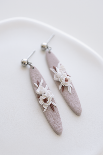 PALE BLOSSOM hand-sculpted earrings with vintage, floral design, perfect for weddings and everyday wear. Inspired by nature, made in Dubai.