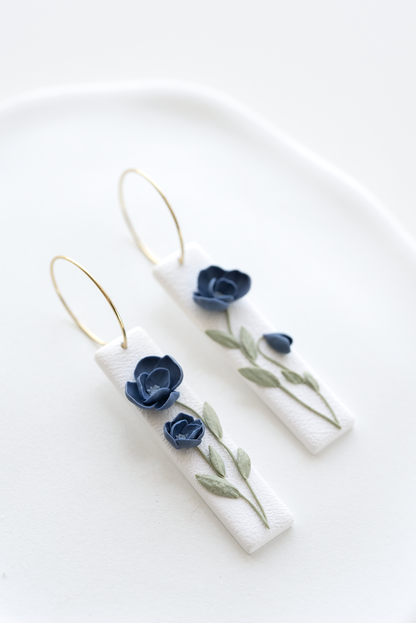 MEADOW SONG hand-sculpted floral earrings made in Dubai, blue flowers, inspired by nature, intricate details