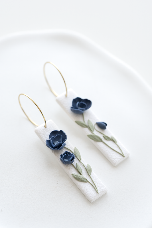 MEADOW SONG hand-sculpted floral earrings made in Dubai, blue flowers, inspired by nature, intricate details